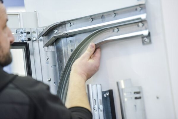 Components for both residential and industrial sectional doors