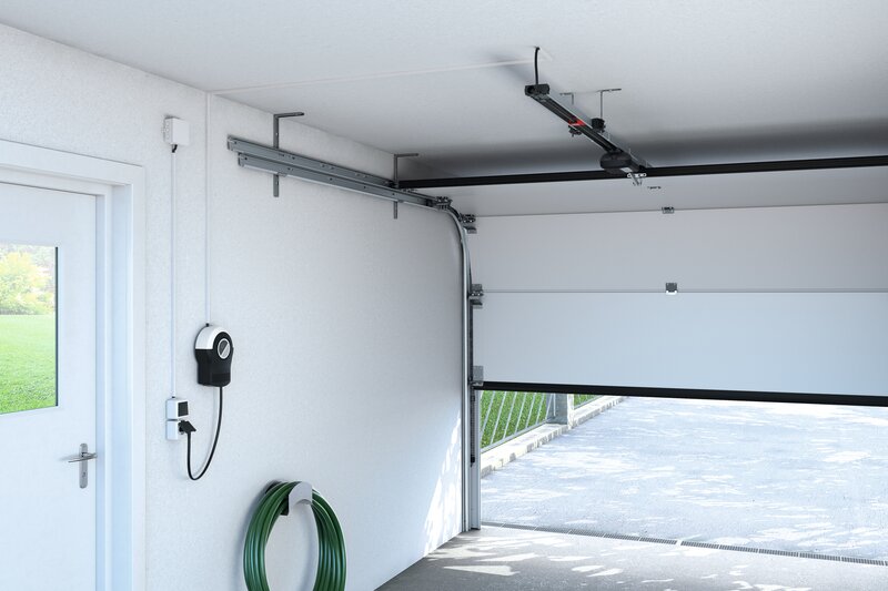 Sectional door with a garage door operator